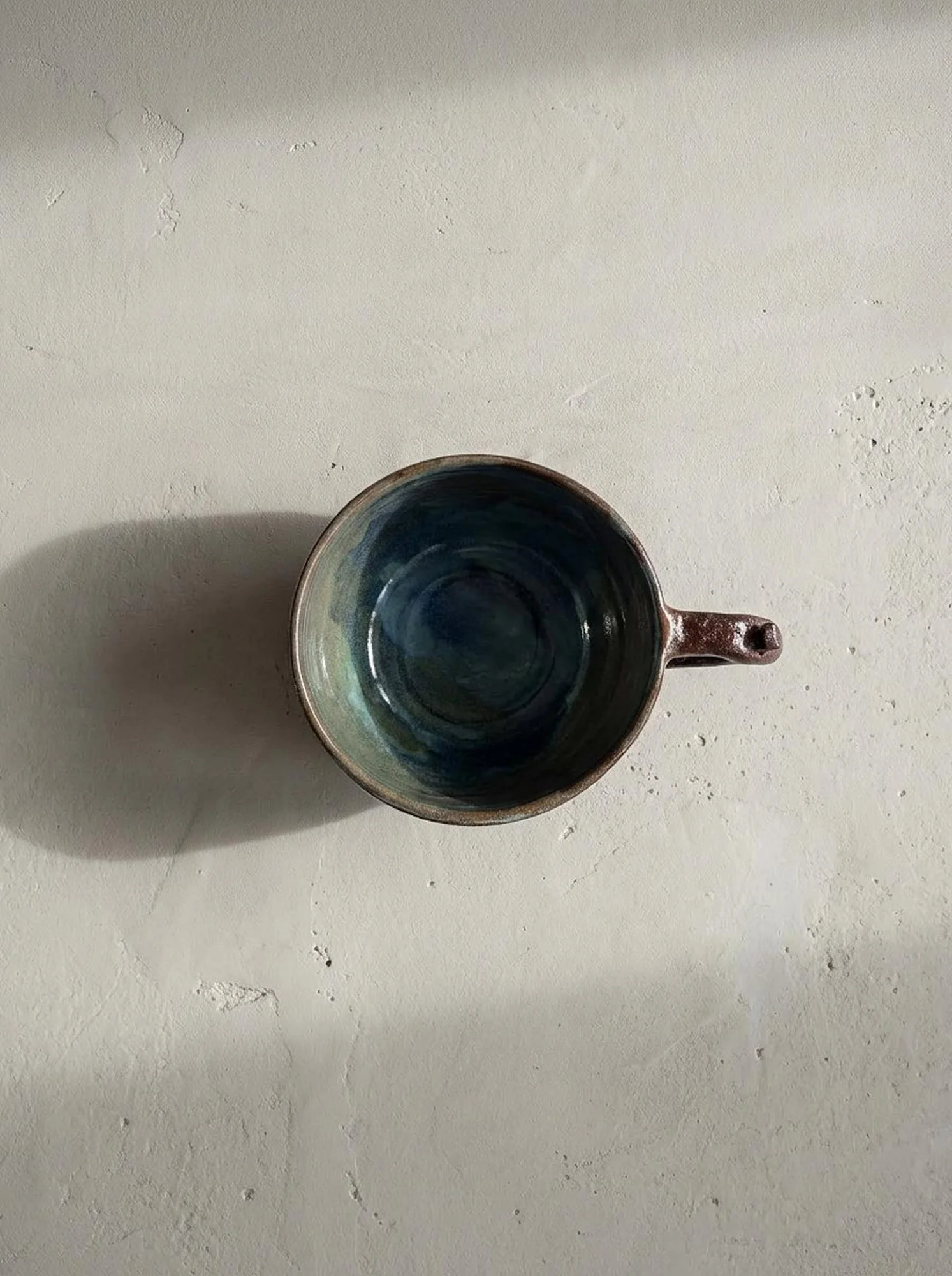 Dark Brown Carved Mug - detail view